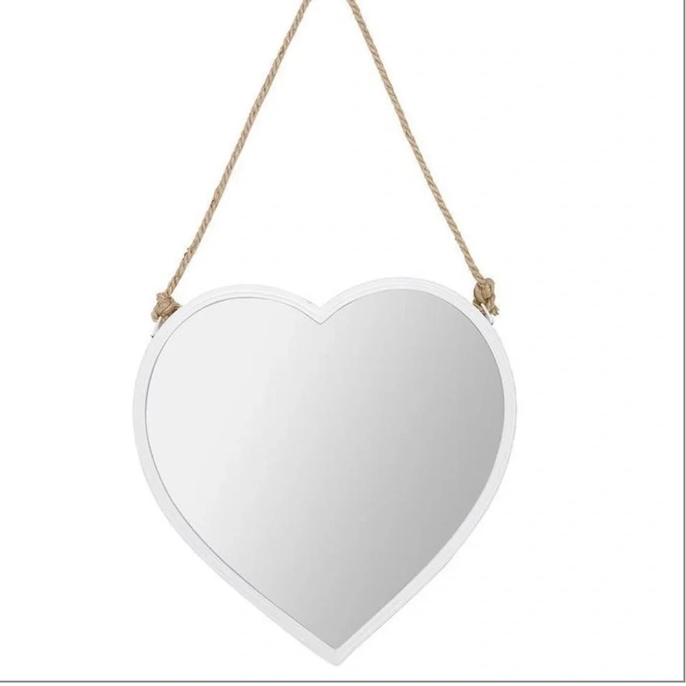 White hanging heart mirror on a rope. Coastal.